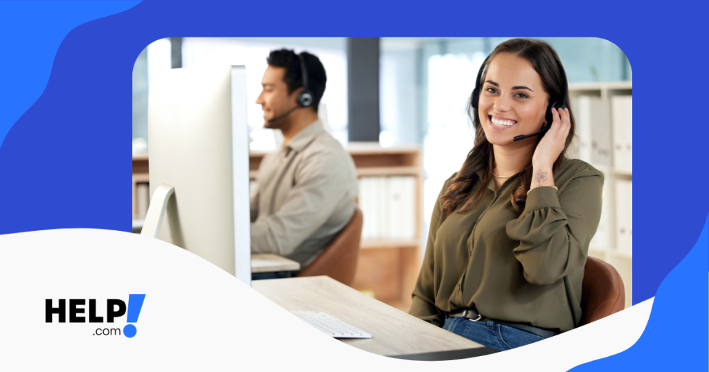 customer support person sitting behind a desk with a headset on helping a customer.